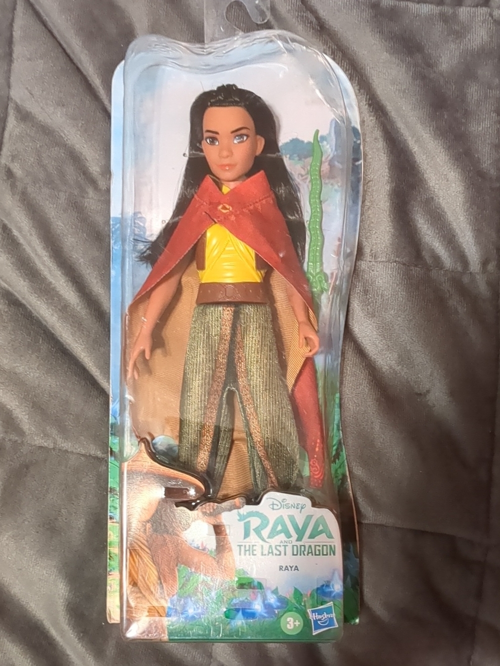 Disney Raya Doll in Red Cape with Yellow Top and Green Pants